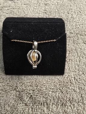 Silver Tone Cage Pendant with Champagne Pearl Accent